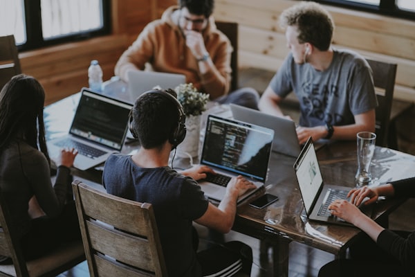 Team working together in a bright office